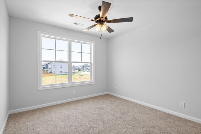 272 Kildeer Dr, Clarksville, TN 37040 - carpeted spare room featuring baseboards and a ceiling fan