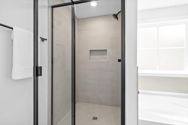 272 Kildeer Dr, Clarksville, TN 37040 - bathroom featuring a shower stall and a tub