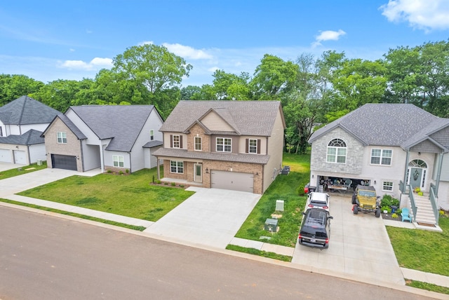 272 Kildeer Dr, Clarksville, TN 37040 - view of front of house featuring driveway, a front yard, a shingled roof, and brick siding