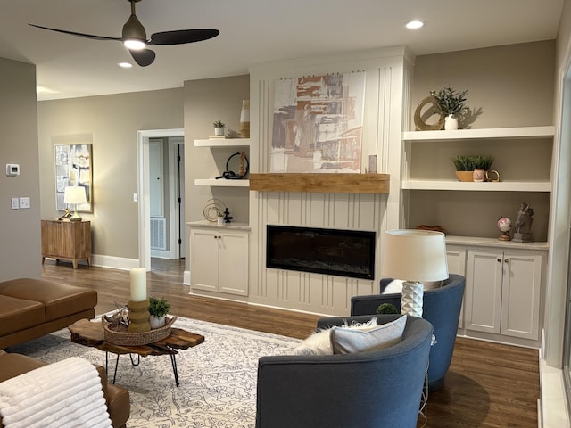 1611 Martha Washington Way, Murfreesboro, TN 37130 - living area featuring dark wood-type flooring, ceiling fan, a fireplace, built in features, and recessed lighting