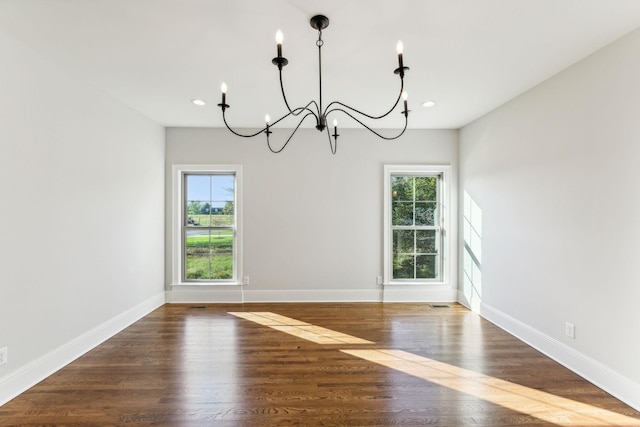 1611 Martha Washington Way, Murfreesboro, TN 37130 - unfurnished dining area featuring a chandelier, wood finished floors, recessed lighting, and baseboards