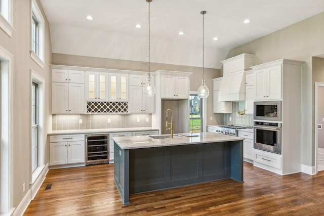 1611 Martha Washington Way, Murfreesboro, TN 37130 - kitchen featuring beverage cooler, stainless steel appliances, a sink, vaulted ceiling, and backsplash
