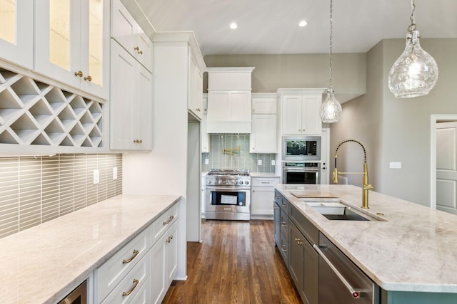 1611 Martha Washington Way, Murfreesboro, TN 37130 - kitchen featuring stainless steel appliances, a sink, white cabinetry, decorative backsplash, and dark wood-type flooring