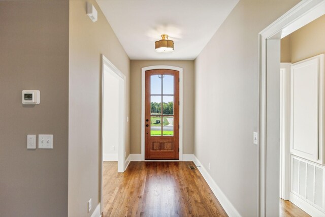 1611 Martha Washington Way, Murfreesboro, TN 37130 - doorway with wood finished floors, baseboards, and arched walkways