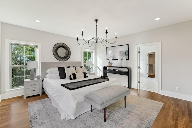 1611 Martha Washington Way, Murfreesboro, TN 37130 - bedroom featuring a chandelier, wood finished floors, multiple windows, baseboards, and recessed lighting