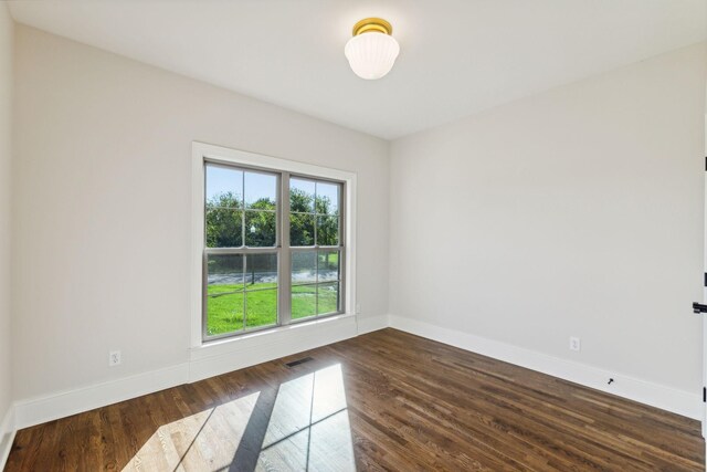 1611 Martha Washington Way, Murfreesboro, TN 37130 - spare room featuring baseboards and dark wood-style floors