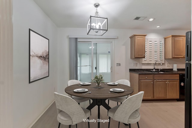 209 Bakerview St, Murfreesboro, TN 37129 - dining area with light wood-style floors, a chandelier, recessed lighting, and plenty of natural light
