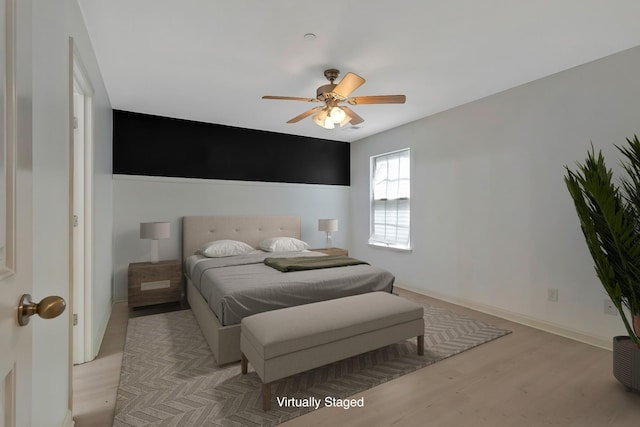 209 Bakerview St, Murfreesboro, TN 37129 - bedroom with light wood finished floors, a ceiling fan, and baseboards