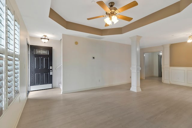 209 Bakerview St, Murfreesboro, TN 37129 - entrance foyer with light wood-type flooring, ornate columns, and a ceiling fan