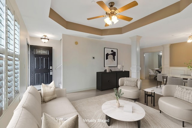 209 Bakerview St, Murfreesboro, TN 37129 - living area with ornate columns, ceiling fan, and a wainscoted wall