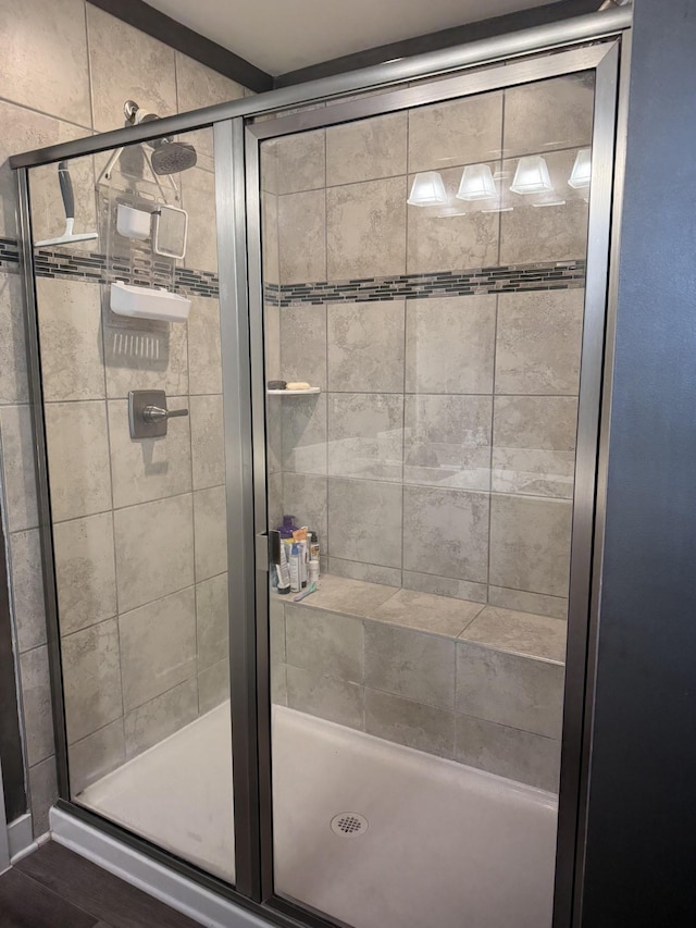bathroom featuring a shower stall