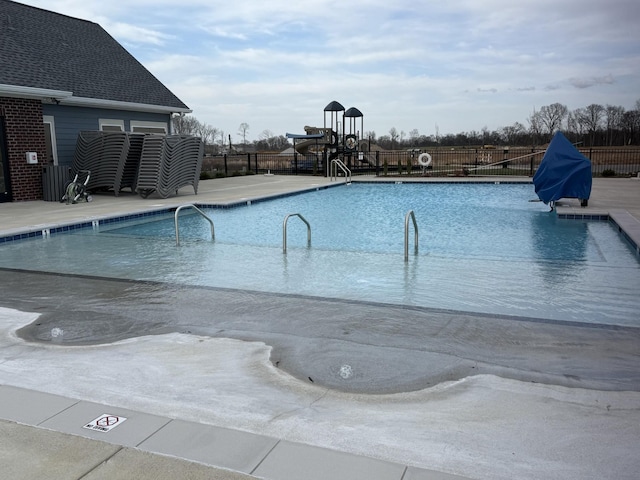 community pool with fence