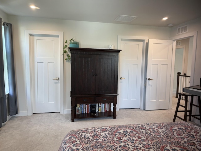 carpeted bedroom with recessed lighting and baseboards