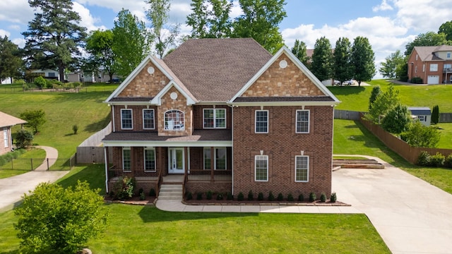 4050 Oak Pointe Dr, Pleasant View, TN 37146 - view of front of property featuring a porch, brick siding, and stone siding