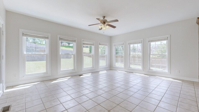 4050 Oak Pointe Dr, Pleasant View, TN 37146 - unfurnished room with light tile patterned flooring, a ceiling fan, and baseboards