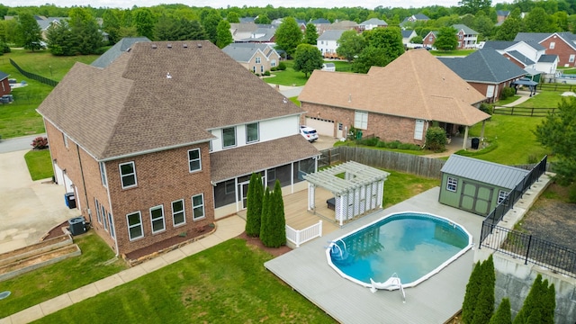 4050 Oak Pointe Dr, Pleasant View, TN 37146 - view of pool featuring a residential view, cooling unit, a pergola, and an outdoor structure