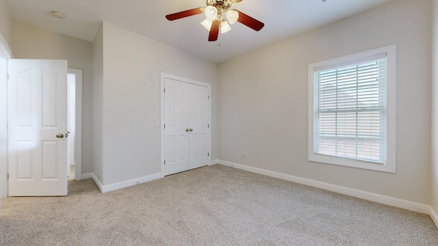4050 Oak Pointe Dr, Pleasant View, TN 37146 - unfurnished bedroom with carpet floors, baseboards, a closet, and ceiling fan