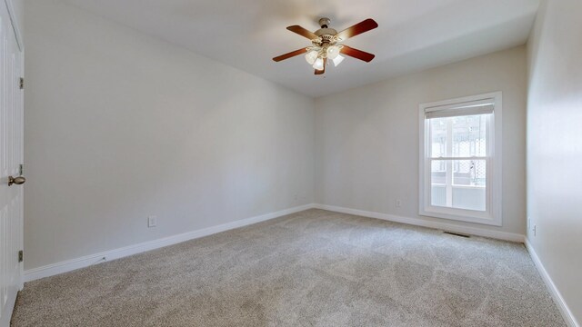 4050 Oak Pointe Dr, Pleasant View, TN 37146 - unfurnished room with carpet, a ceiling fan, and baseboards