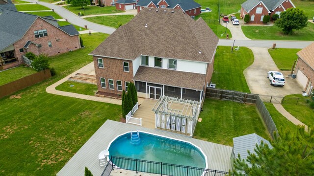 4050 Oak Pointe Dr, Pleasant View, TN 37146 - back of house with roof with shingles, brick siding, and a residential view