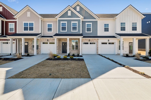 321 Carver Connection, Lebanon, TN 37087 - townhome / multi-family property featuring driveway, a garage, a porch, and board and batten siding
