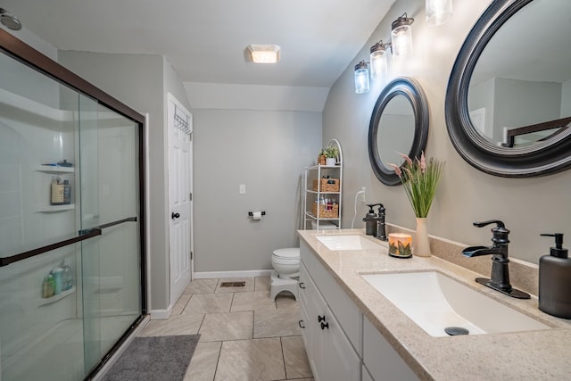 960 Knob Creek Rd, Lawrenceburg, TN 38464 - bathroom featuring a stall shower, toilet, double vanity, tile patterned flooring, and baseboards
