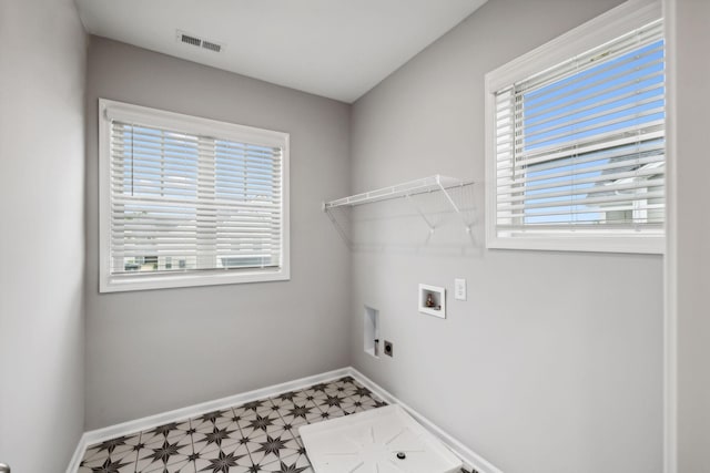325 Carver Connection, Lebanon, TN 37087 - clothes washing area with electric dryer hookup, hookup for a washing machine, tile patterned floors, and baseboards