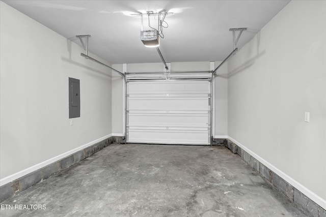 garage featuring a garage door opener and electric panel