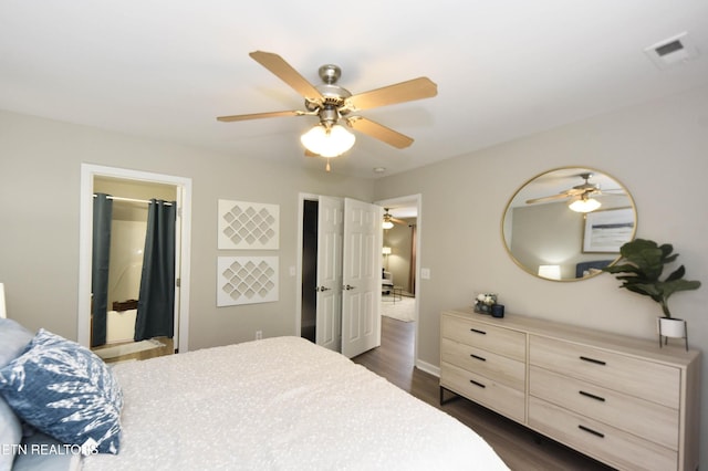 bedroom with dark wood-style flooring, baseboards, and a ceiling fan