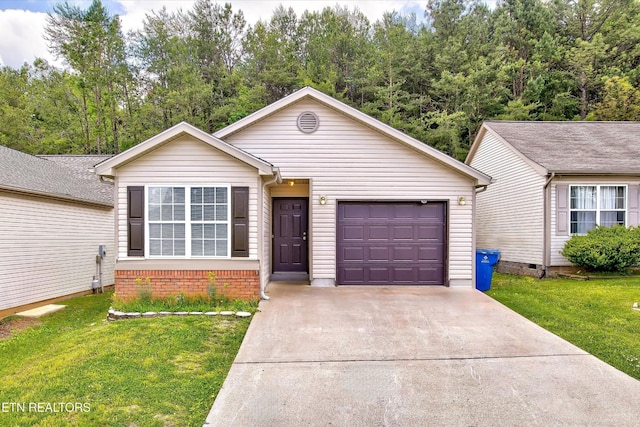 single story home featuring an attached garage, driveway, and a front lawn