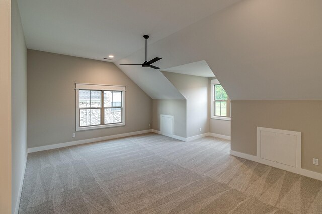 1022 Gadwall Ln, Spring Hill, TN 37174 - bonus room featuring light colored carpet, vaulted ceiling, a ceiling fan, baseboards, and recessed lighting