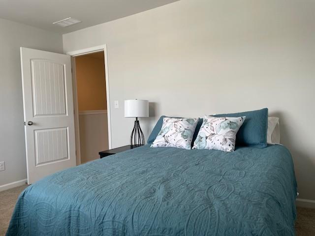 1401 Walker Way, Columbia, TN 38401 - bedroom with carpet floors and baseboards