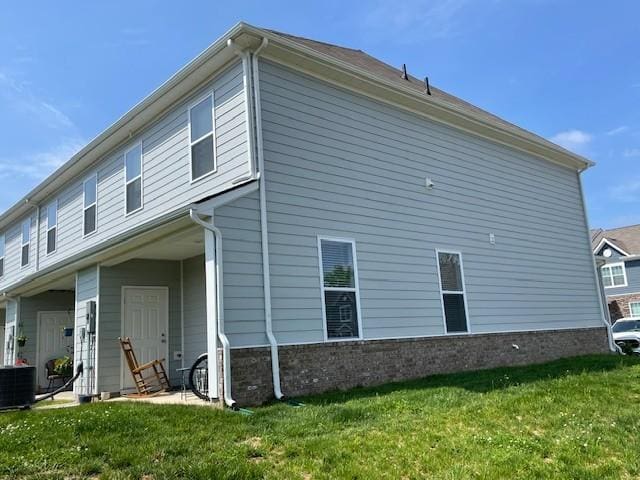 1401 Walker Way, Columbia, TN 38401 - view of property exterior featuring central air condition unit and a lawn