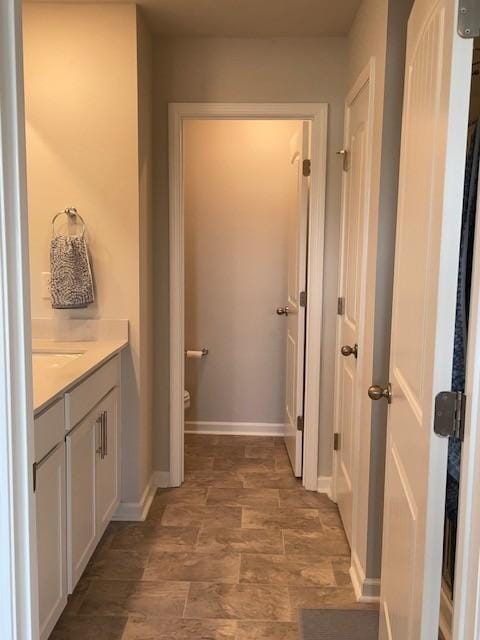 1401 Walker Way, Columbia, TN 38401 - bathroom with vanity, toilet, and baseboards