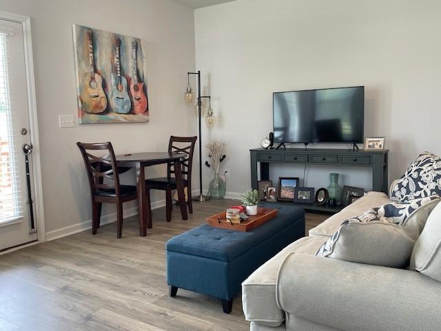 1401 Walker Way, Columbia, TN 38401 - living room with light wood-style floors and baseboards