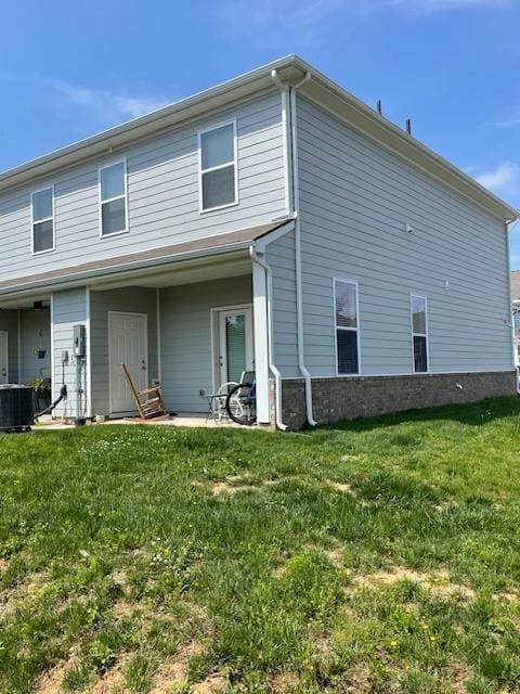 1401 Walker Way, Columbia, TN 38401 - back of property featuring a lawn and central AC unit