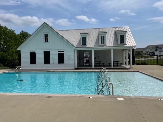 1401 Walker Way, Columbia, TN 38401 - community pool featuring a patio and fence
