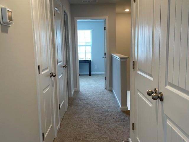 1401 Walker Way, Columbia, TN 38401 - corridor with carpet floors, baseboards, and an upstairs landing