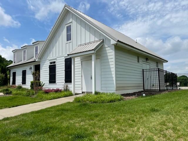 1401 Walker Way, Columbia, TN 38401 - view of front of house with board and batten siding and metal roof