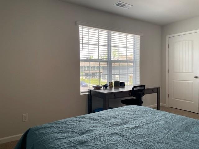 1401 Walker Way, Columbia, TN 38401 - bedroom featuring multiple windows, baseboards, and carpet floors