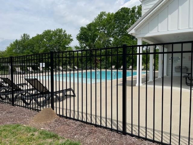 1401 Walker Way, Columbia, TN 38401 - gate with a community pool, fence, and a patio