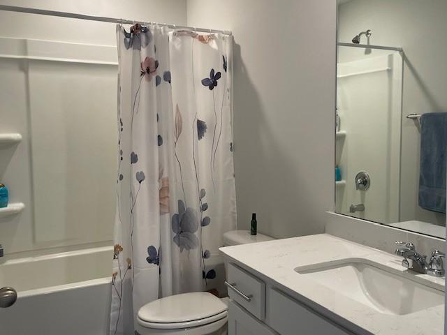 1401 Walker Way, Columbia, TN 38401 - bathroom featuring shower / tub combo, toilet, and vanity