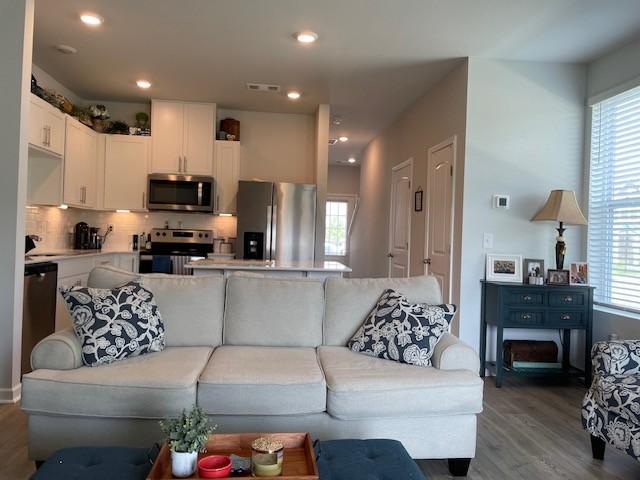 1401 Walker Way, Columbia, TN 38401 - living room with wood finished floors, healthy amount of natural light, and recessed lighting