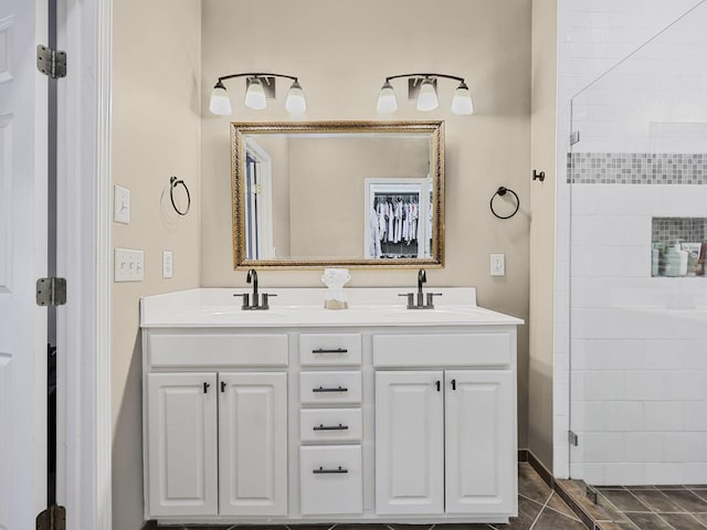 2050 Morrison Ave, Spring Hill, TN 37174 - bathroom featuring double vanity and a tile shower