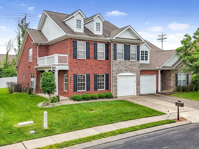 2050 Morrison Ave, Spring Hill, TN 37174 - view of front of home with driveway, a front lawn, brick siding, a shingled roof, and an attached garage