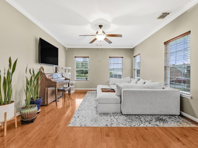 2050 Morrison Ave, Spring Hill, TN 37174 - living room with ceiling fan, wood finished floors, ornamental molding, and baseboards