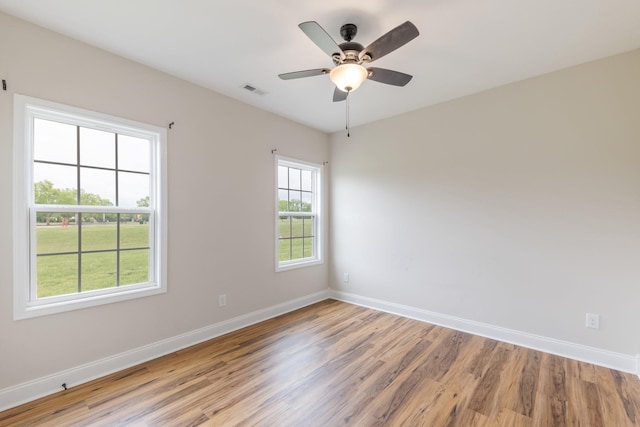 258 Jesse Dr, Pleasant View, TN 37146 - unfurnished room with light wood finished floors, baseboards, and a ceiling fan