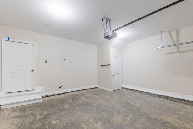 258 Jesse Dr, Pleasant View, TN 37146 - garage with a garage door opener, baseboards, and electric panel
