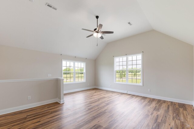 258 Jesse Dr, Pleasant View, TN 37146 - empty room with ceiling fan, wood finished floors, lofted ceiling, and baseboards