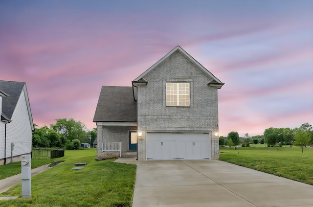 258 Jesse Dr, Pleasant View, TN 37146 - traditional-style house featuring brick siding, a garage, driveway, and a front yard