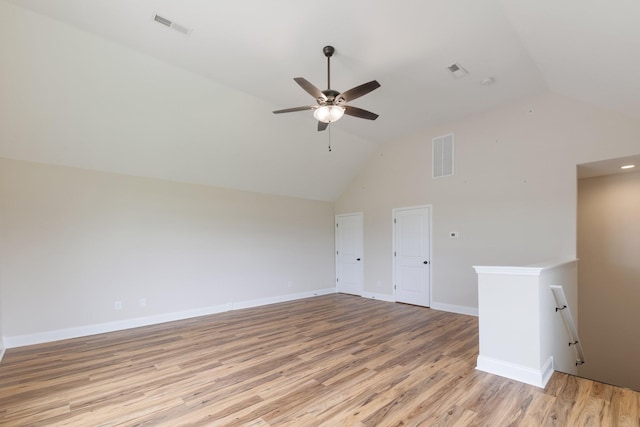 258 Jesse Dr, Pleasant View, TN 37146 - unfurnished living room with lofted ceiling, light wood-type flooring, a ceiling fan, and baseboards